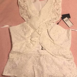 BCBGMaxAzria Tops - New with tags BCBG lace shirt. BCBGMaxAzria Tops - New with tags BCBG lace shirt.